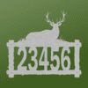 a house number and elk on a log frame