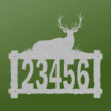 a house number and elk on a log frame