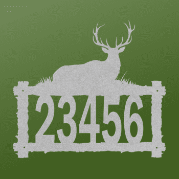 a house number and elk on a log frame
