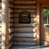 arched welcome moose sign