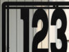 Powder coated steel house number sign up close detail