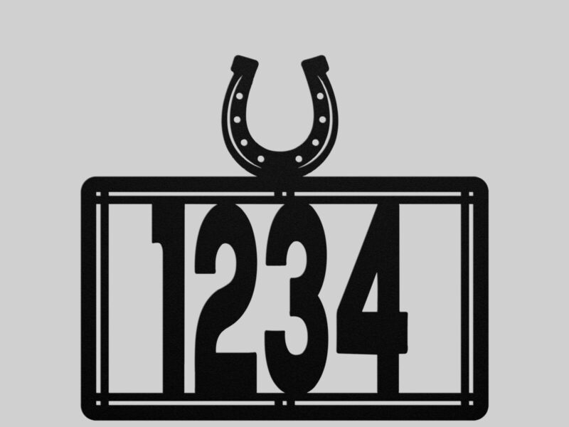 metal house number sign with horseshoe